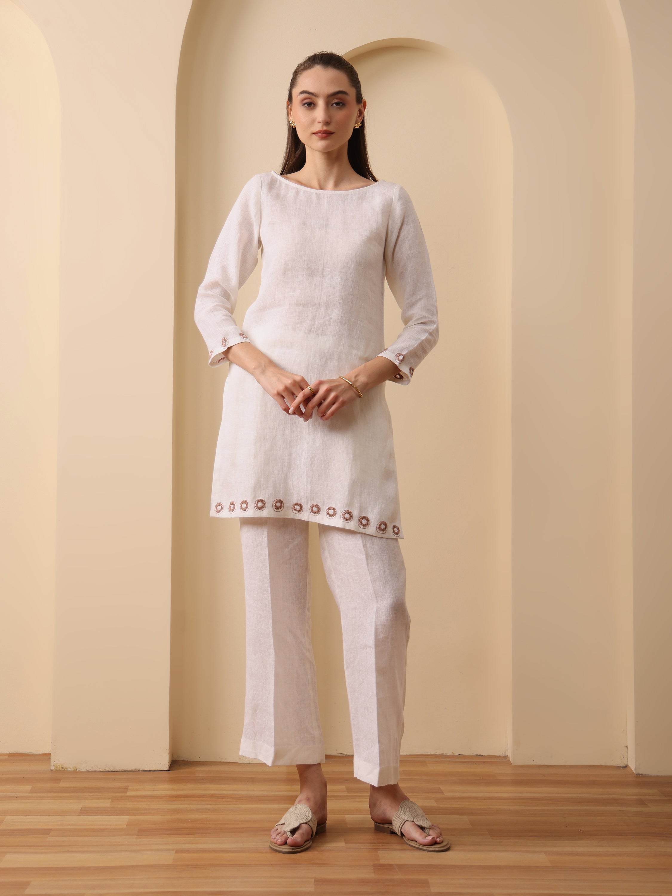 Off white lenin embroidered boat neck kurta with pant