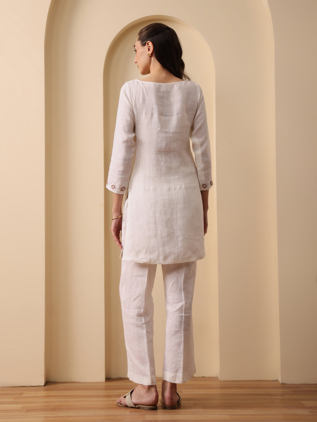 Off white lenin embroidered boat neck kurta with pant