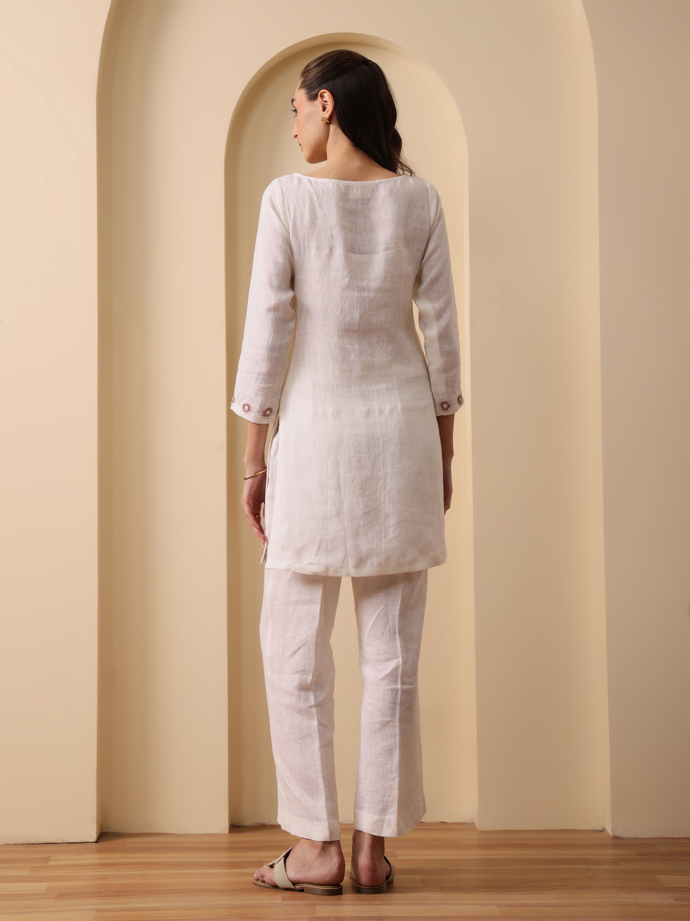 Off white lenin embroidered boat neck kurta with pant