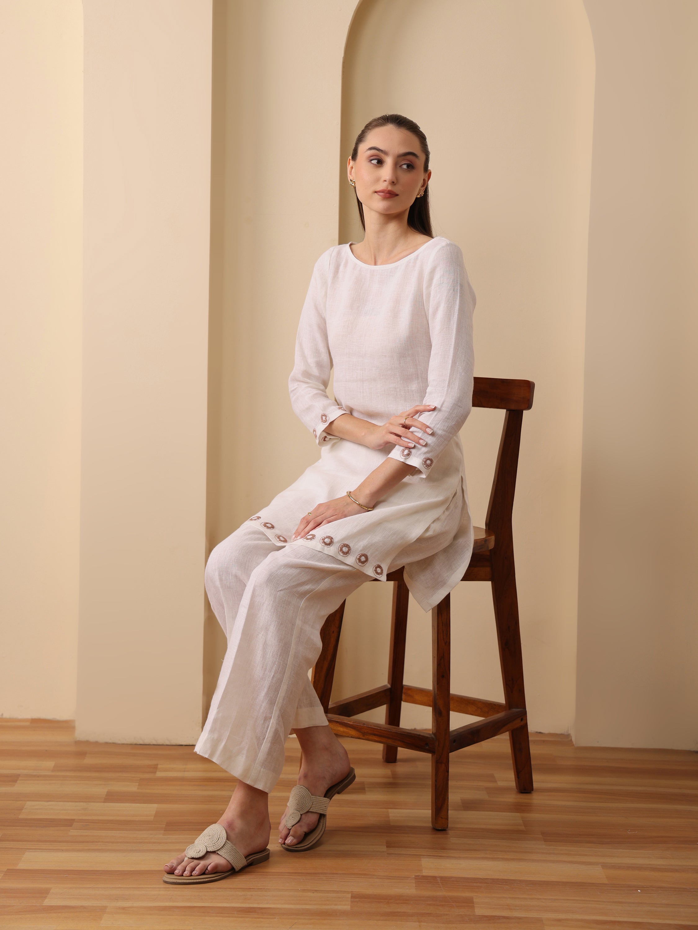 Off white lenin embroidered boat neck kurta with pant