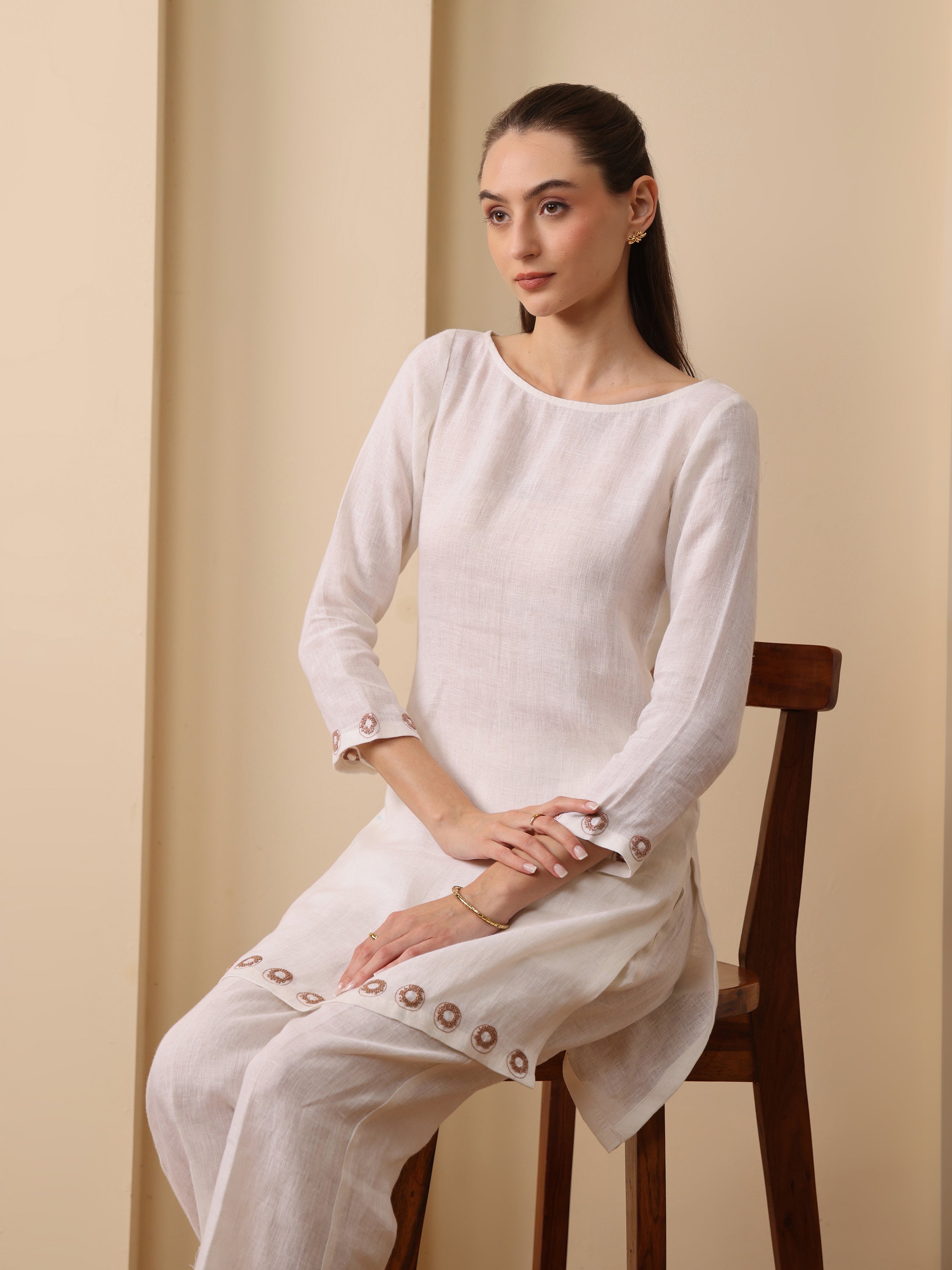 Off white lenin embroidered boat neck kurta with pant